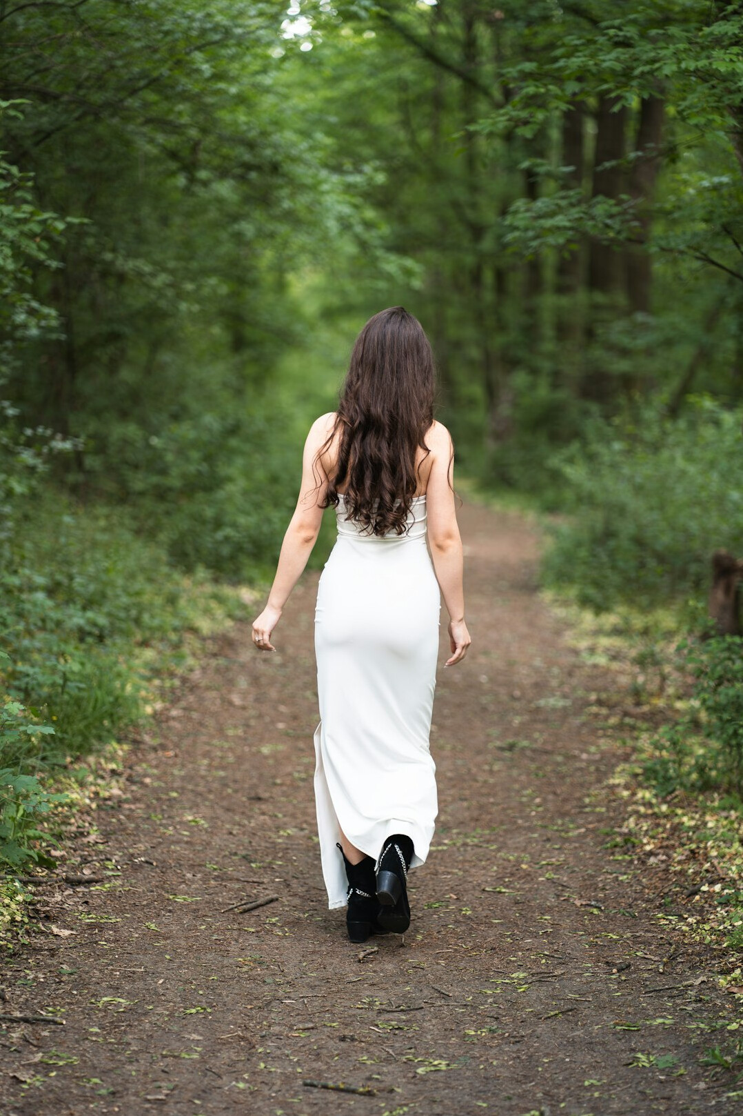 woman walking in forest