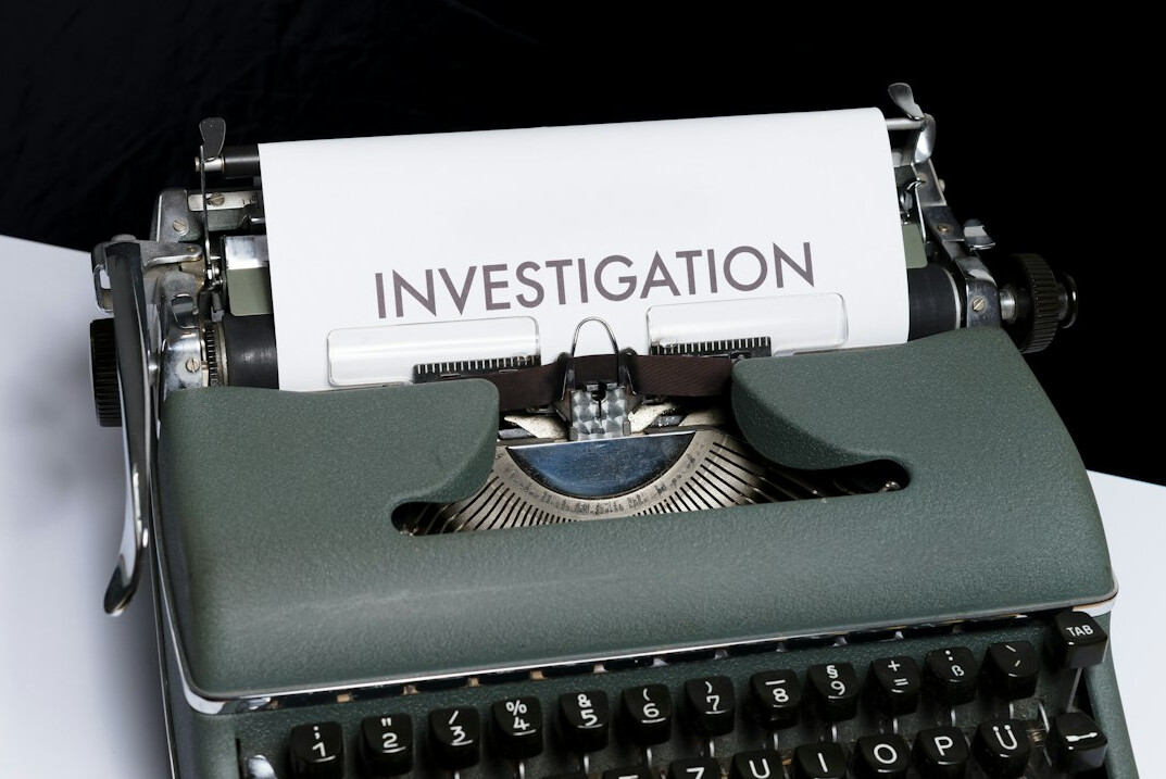 investigator examining evidence