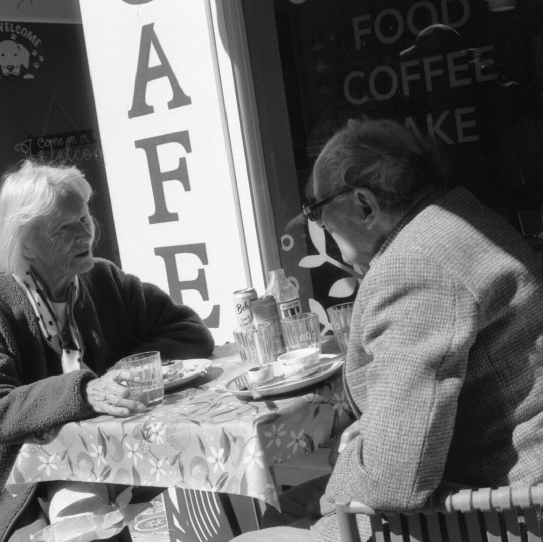 clandestine meeting in cafe